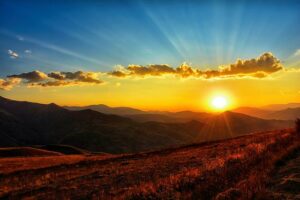 the first gleam of dawn